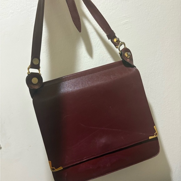 Cartier Handbags - Cartier Burgundy Crossbody Bag with Gold Accents